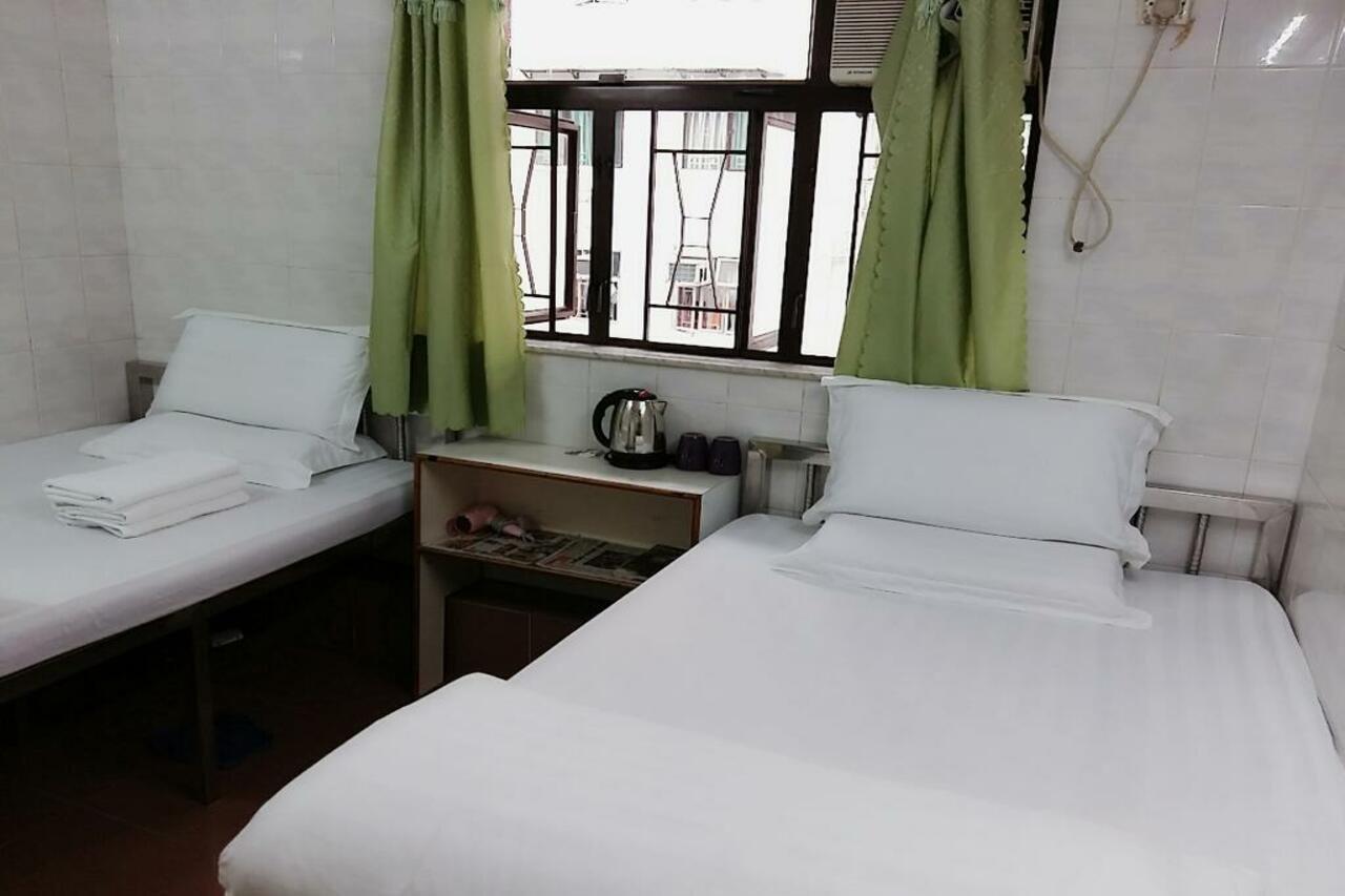 New Yan Yan Guest House reception 9th floor Flat E4 E6 Hongkong Buitenkant foto