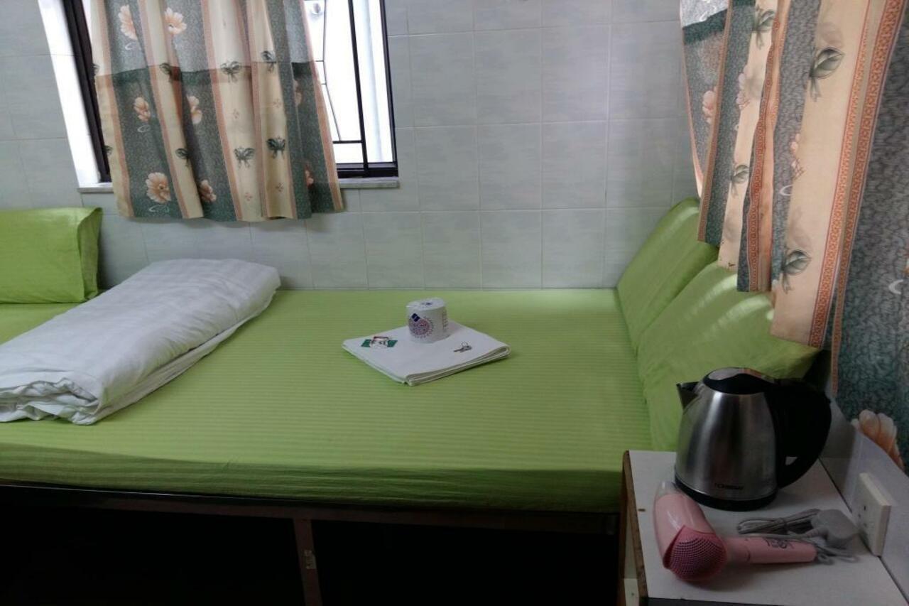 New Yan Yan Guest House reception 9th floor Flat E4 E6 Hongkong Buitenkant foto