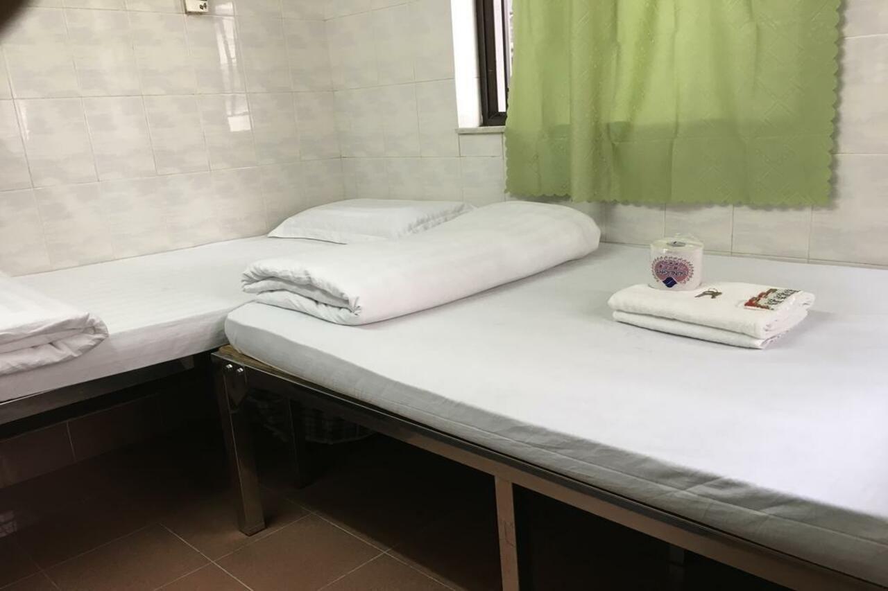 New Yan Yan Guest House reception 9th floor Flat E4 E6 Hongkong Buitenkant foto