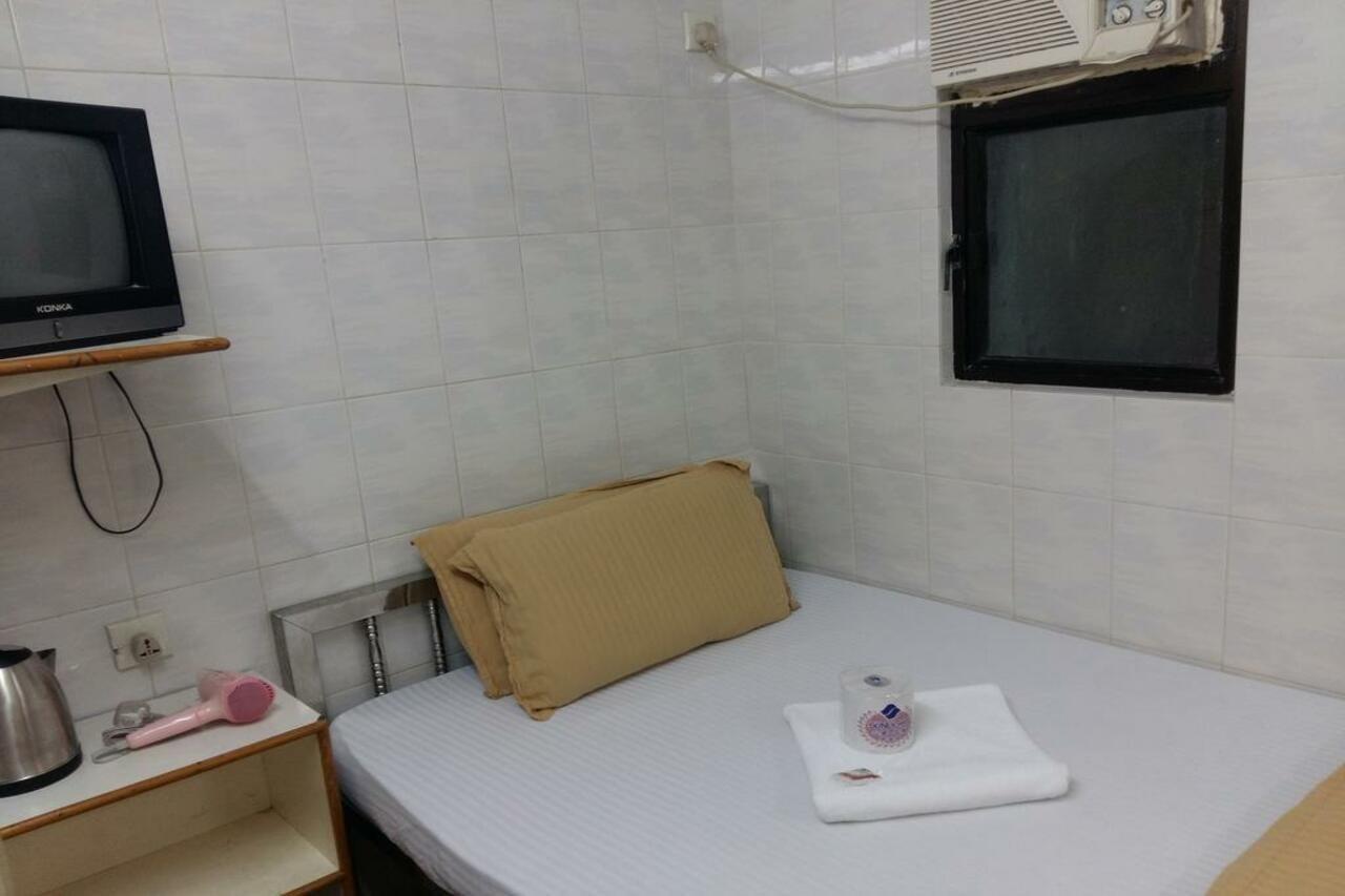 New Yan Yan Guest House reception 9th floor Flat E4 E6 Hongkong Buitenkant foto