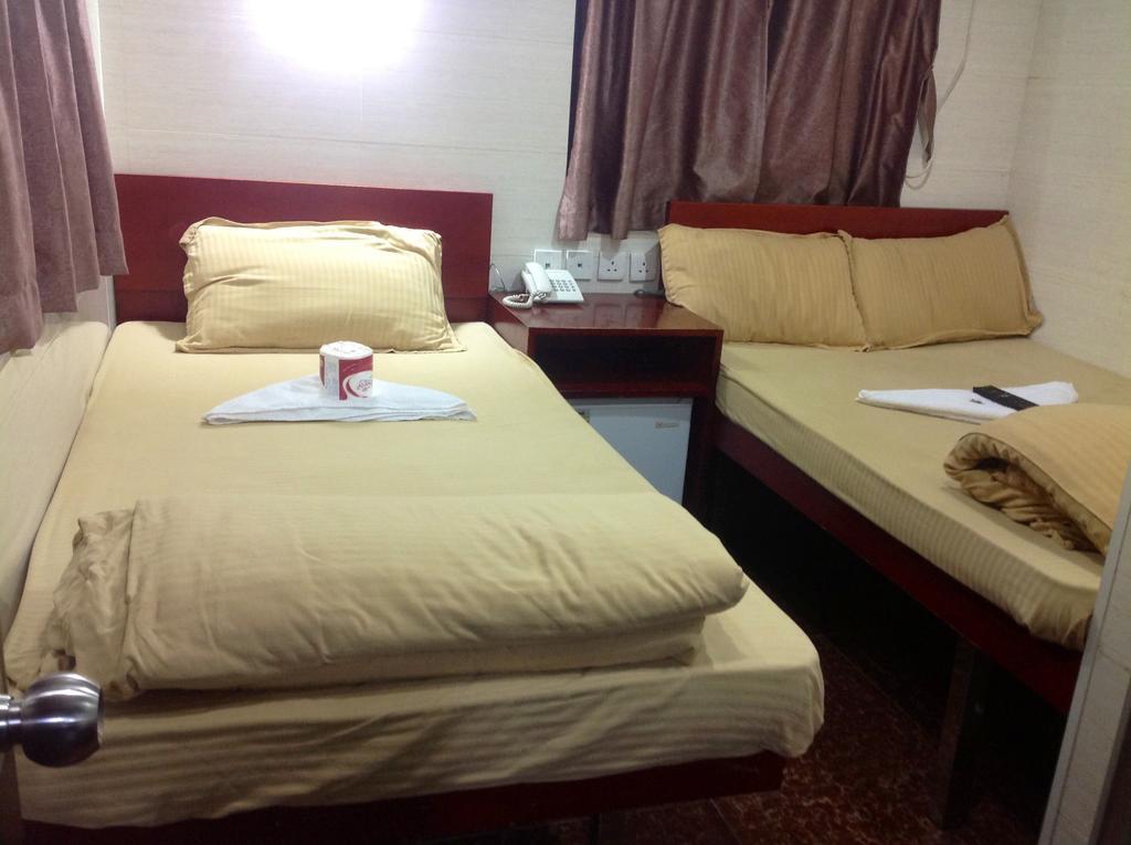 New Yan Yan Guest House reception 9th floor Flat E4 E6 Hongkong Buitenkant foto
