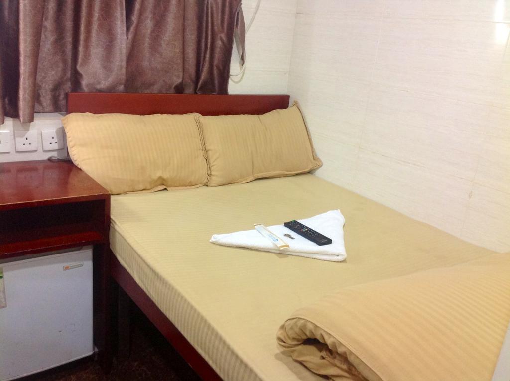 New Yan Yan Guest House reception 9th floor Flat E4 E6 Hongkong Buitenkant foto