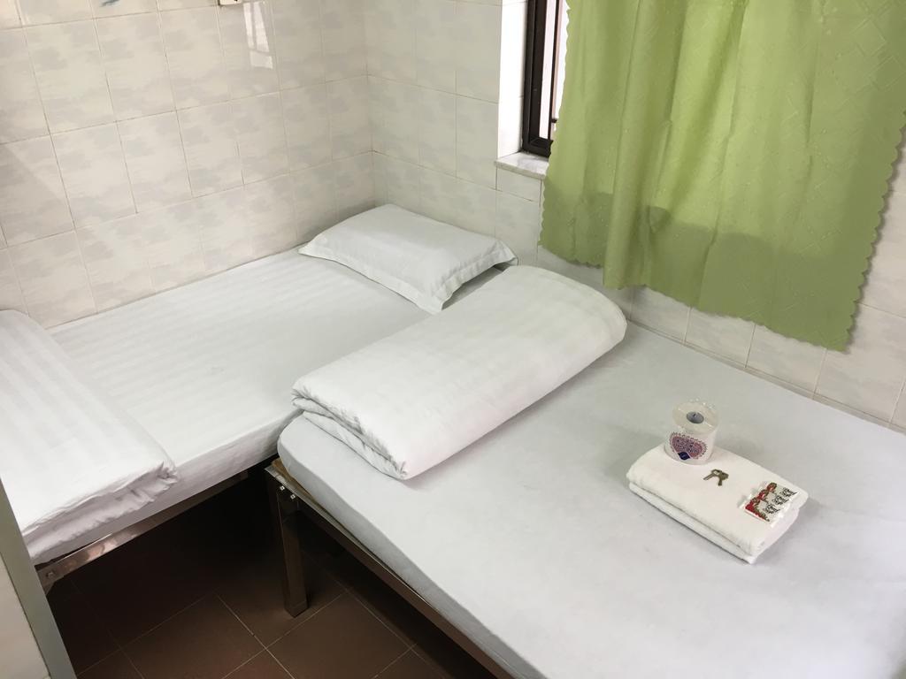 New Yan Yan Guest House reception 9th floor Flat E4 E6 Hongkong Buitenkant foto