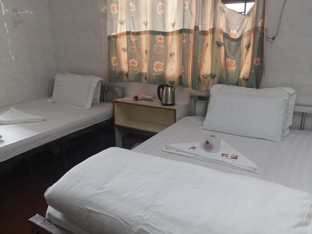 New Yan Yan Guest House reception 9th floor Flat E4 E6 Hongkong Buitenkant foto