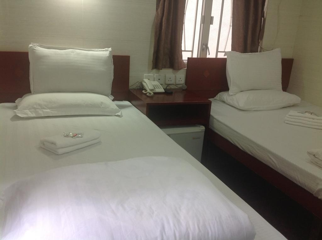 New Yan Yan Guest House reception 9th floor Flat E4 E6 Hongkong Buitenkant foto